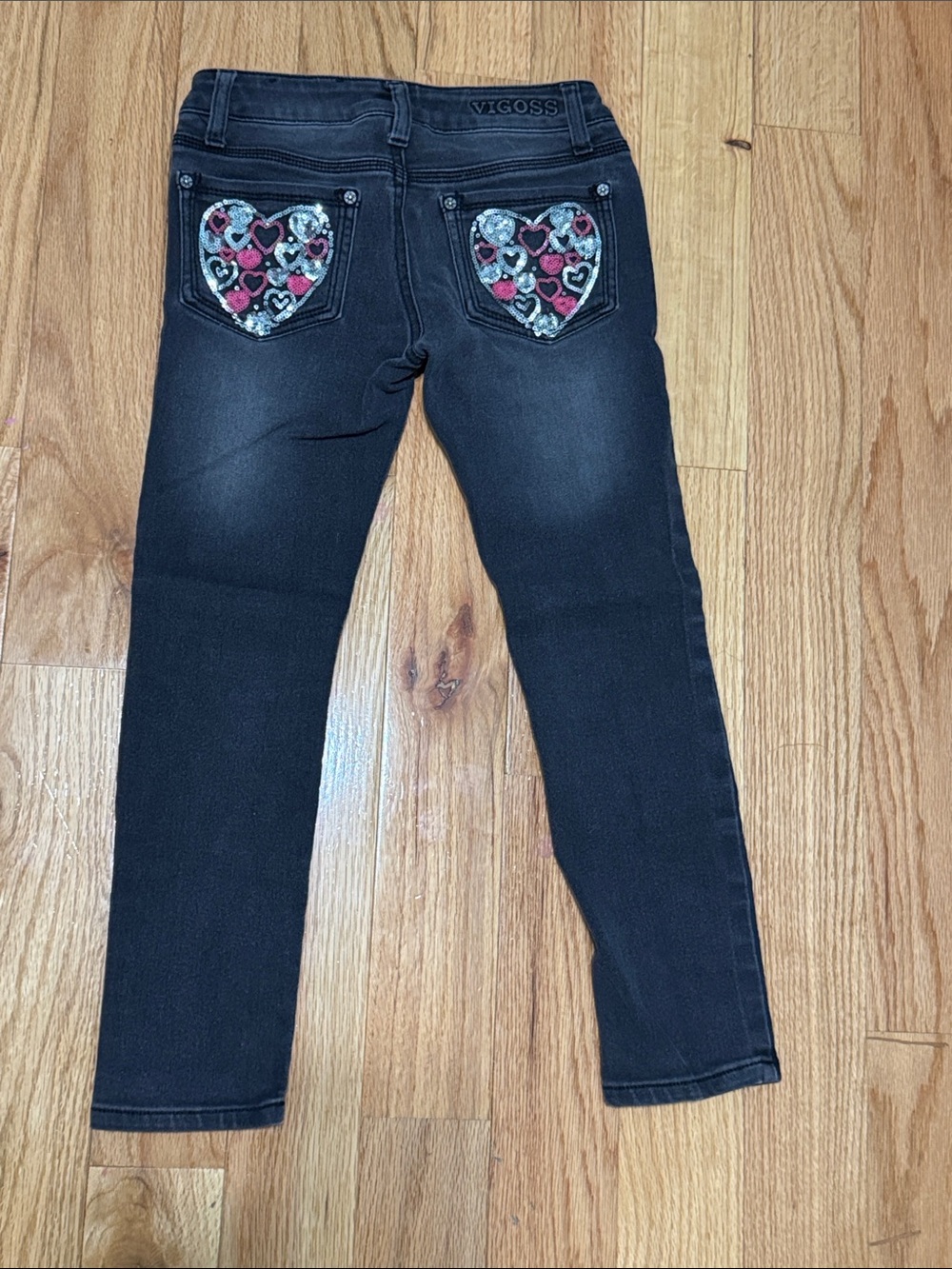 Vigoss Black Skinny Jeans with Heart-Embellished Back Pockets